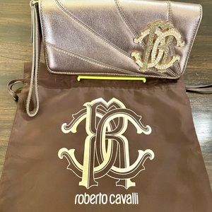 Roberto Cavalli gold leather clutch/wristlet with rhinestones.